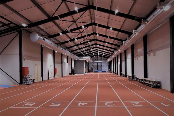 Aanleg kunststof atletiekpiste in PU indoor - Sportinfrabouw NV